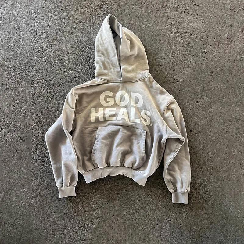 Sudadera informal con capucha y estampado God Heals de TICOSA